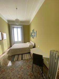 Ein Bett oder Betten in einem Zimmer der Unterkunft Gambara Apartment