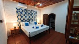 Boutique Hotel Secret Garden Granada客房内的一张或多张床位