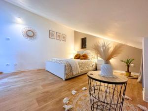 Posedenie v ubytovaní Le petit Châtaignier - Cozy Immo