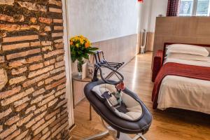 Postel nebo postele na pokoji v ubytování Kolbe Hotel Rome