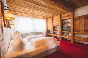 Postel nebo postele na pokoji v ubytování Hotel Luise