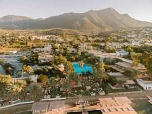 an aerial view of a resort with mountains in the background at Flamm in Golturkbuku