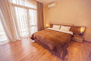 Postel nebo postele na pokoji v ubytování Royal Venezia Hotel