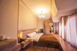 Postel nebo postele na pokoji v ubytování Royal Venezia Hotel