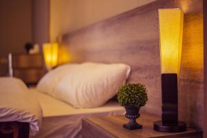 Postel nebo postele na pokoji v ubytování Royal Venezia Hotel