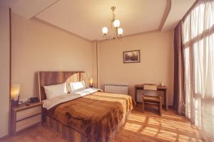 Postel nebo postele na pokoji v ubytování Royal Venezia Hotel