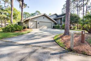 a house with a driveway with a garage at Canopy on Cobblestone in Wesley Chapel