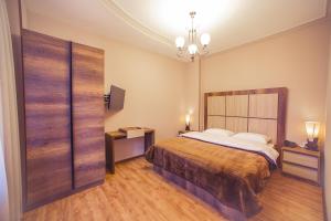 Postel nebo postele na pokoji v ubytování Royal Venezia Hotel
