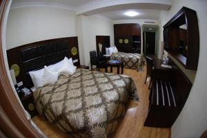 Cama o camas de una habitación en Era Palace Hotel