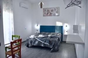 Postel nebo postele na pokoji v ubytování B&B Aurora