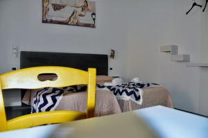 Postel nebo postele na pokoji v ubytování B&B Aurora