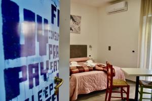 Postel nebo postele na pokoji v ubytování B&B Aurora
