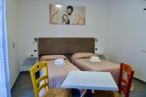 Postel nebo postele na pokoji v ubytování B&B Aurora