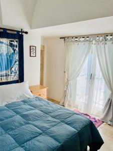 Ein Bett oder Betten in einem Zimmer der Unterkunft Villa Basso 2