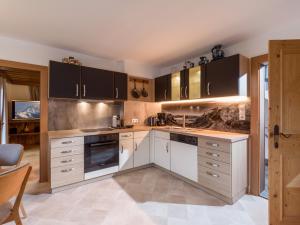 Kuchyň nebo kuchyňský kout v ubytování Ferienhaus Rauter