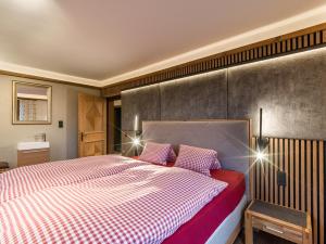 Postel nebo postele na pokoji v ubytování Ferienhaus Rauter + 14 fotografií