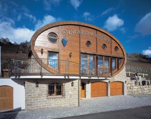 a round building with a balcony on top of it at Schlosshotel Ingelfingen in Ingelfingen