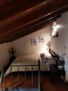 Postel nebo postele na pokoji v ubytování Rodia