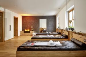 Postel nebo postele na pokoji v ubytování der grüne Baum Mountain Boutique Hotel