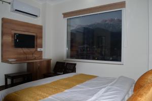 Afbeelding uit fotogalerij van HIMALAYA INN in Pālampur +21 foto's