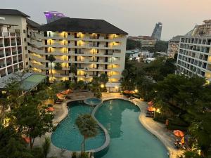 an aerial view of a hotel with a swimming pool at Pattaya Condo Wongamat Privacy Resort - Naklua in North Pattaya