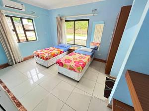 Letto o letti in una camera di Main Stream Beach Villa