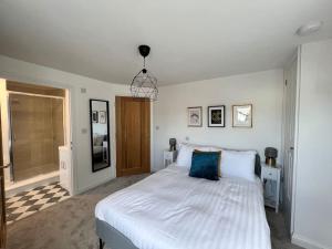 Postel nebo postele na pokoji v ubytování Ashton Mews - in the heart of Broadstairs