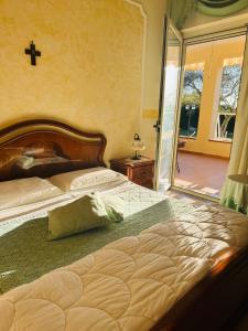 Postel nebo postele na pokoji v ubytování B&B Antica Forneria