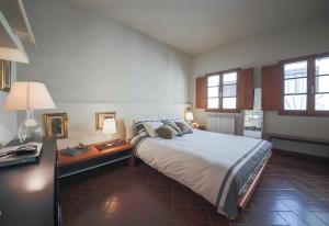 Postelja oz. postelje v sobi nastanitve Apartments Florence San Niccolò terrace