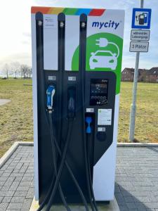 a gas station with a car charge station at Sonnenschein in Uelzen
