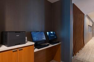 TV a/nebo společenská místnost v ubytování SpringHill Suites by Marriott Austin North