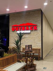 Incrível Apto DF Plaza com vista餐厅或其他用餐的地方