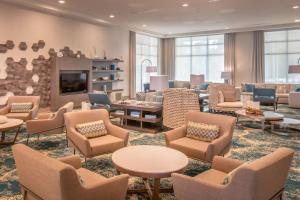 Televiisor ja/või meelelahutuskeskus majutusasutuses Courtyard by Marriott Jekyll Island