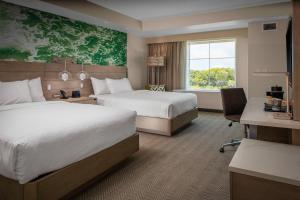 Voodi või voodid majutusasutuse Courtyard by Marriott Jekyll Island toas