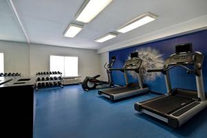 a gym with two treadmills and cardio machines at SpringHill Suites by Marriott Las Cruces in Las Cruces