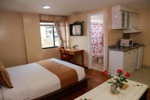 Cucina o angolo cottura di Hotel Carolina Montecarlo