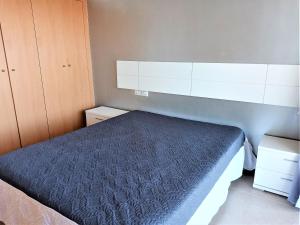 Postel nebo postele na pokoji v ubytování Global Immo 3360 LES MARINES GARBI 4-2