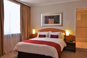 מיטה או מיטות בחדר ב-Cumberland Hotel Worcester