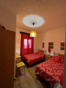 A bed or beds in a room at Casa Bimba