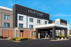 a rendering of the front of a hotel at Courtyard Newburgh Stewart Airport in Newburgh