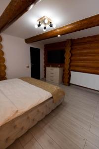 Łóżko lub łóżka w pokoju w obiekcie Cold River Resort