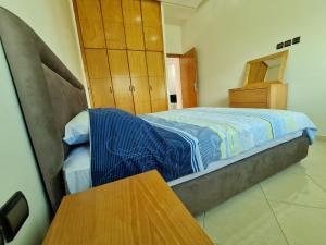 Säng eller sängar i ett rum på Agreable appartement dans une résidence calme sécurisée