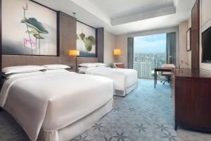 Katil atau katil-katil dalam bilik di Sheraton Shanghai Jiading Hotel
