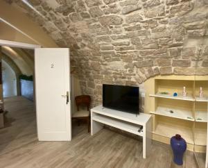 A television and/or entertainment centre at Solo Vip