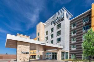 una rappresentazione della parte anteriore di un hotel di Fairfield Inn & Suites Houston Memorial City Area a Houston