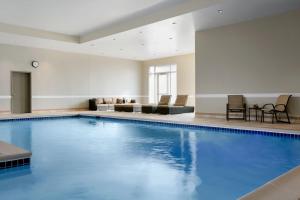 a large swimming pool in a hotel room at Bridgewater Marriott in Bridgewater