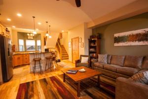 a living room with a couch and a table at Village Point 101 in Breckenridge