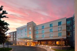 a rendering of a hotel at sunset at Fairfield Inn & Suites By Marriott Louisville Northeast in Louisville