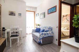 Et opholdsområde på [1km dalla Torre] Appart. con balcone e posto auto