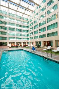 a swimming pool in front of a building at Rochester Marriott Mayo Clinic Area in Rochester